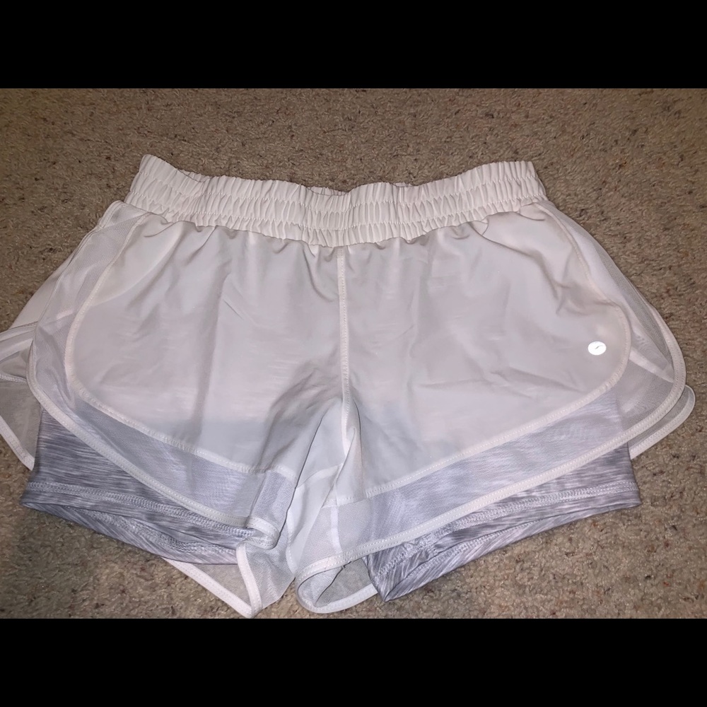 white athletic shorts with spandex inside